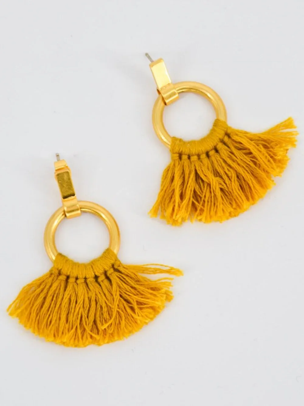 Madewell tassel statement